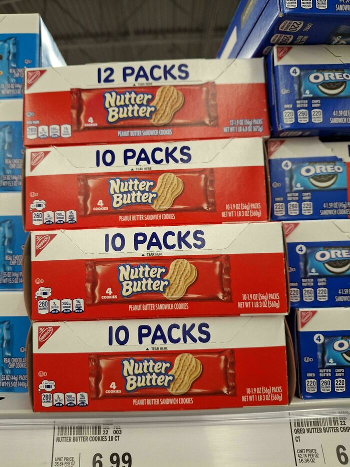 Boxes of Nutter Butter peanut butter sandwich cookies with misleading packaging showing different pack counts on store shelf.