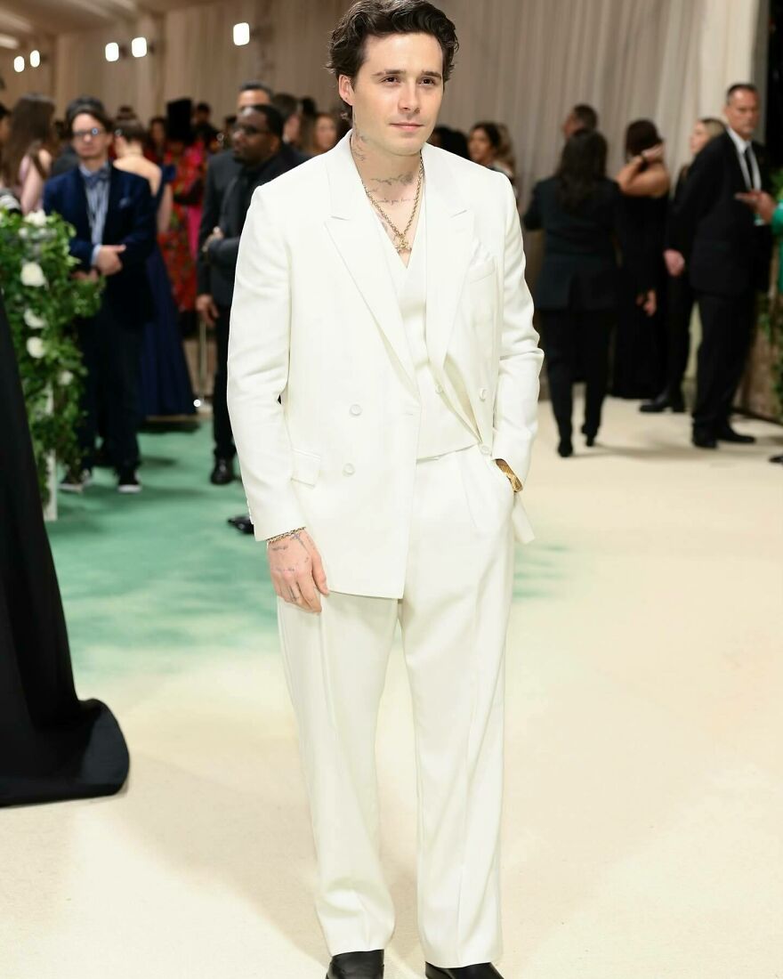 Brooklyn Beckham in a white suit at a formal event, representing one of the nepo babies defining Hollywood’s new generation. Brooklyn Beckham in a white suit at a formal event, representing one of the nepo babies defining Hollywood’s new generation.