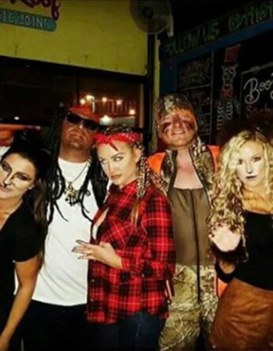 Group of people dressed in Halloween costumes showing lack of common sense in their Halloween costume choices.