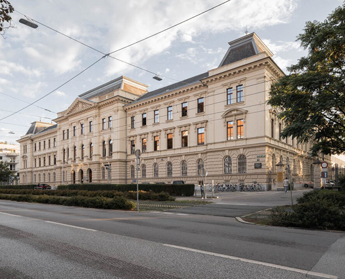 Large historic building under a partly cloudy sky, possibly a hospital related to brain surgeon arrest news. Large historic building under a partly cloudy sky, possibly a hospital related to brain surgeon arrest news.