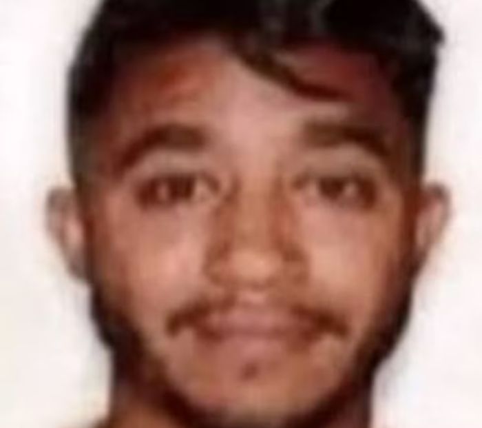 Close-up of a young man with short dark hair and a mustache, linked to a serial criminal case. Close-up of a young man with short dark hair and a mustache, linked to a serial criminal case.