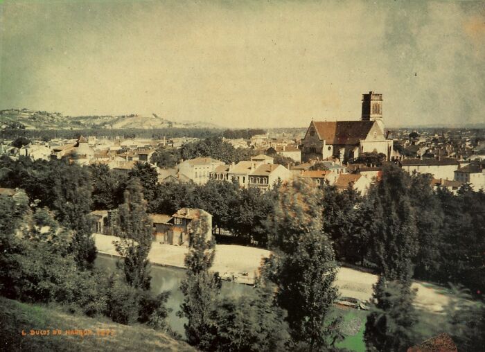 Early photography landscape showing a historic town with a church and river, capturing a scene from the time photography was new.
