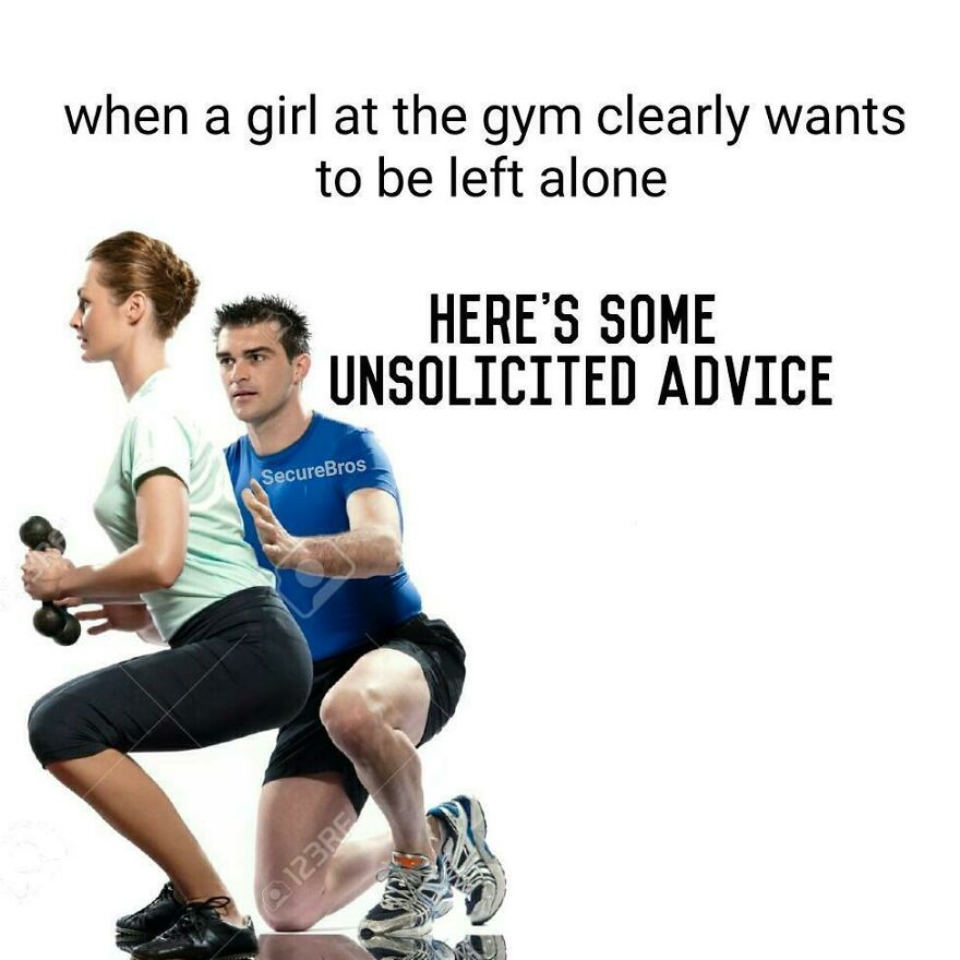 Man in blue shirt giving unsolicited advice to woman exercising at the gym, mocking alpha males behavior humorously.