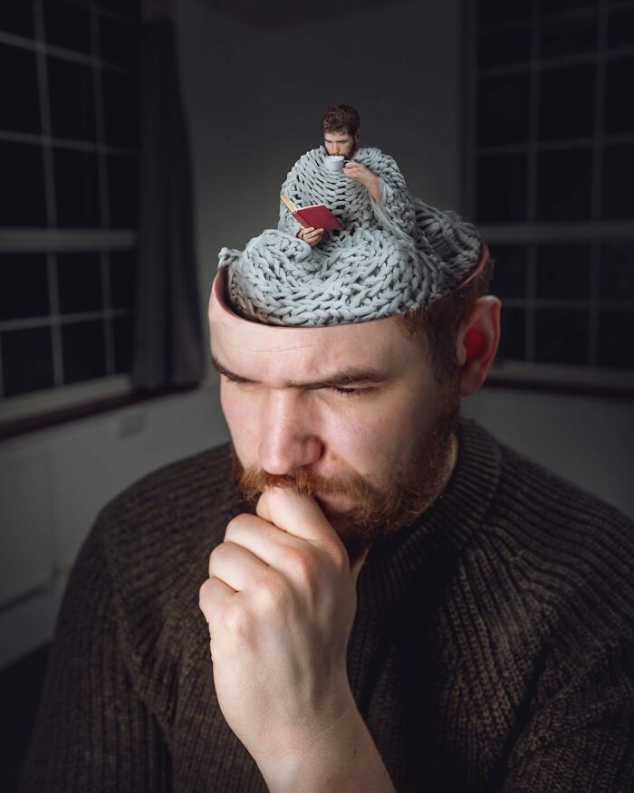 Man with a logic-challenging photo manipulation showing a miniature version of himself reading and drinking inside his knitted brain.