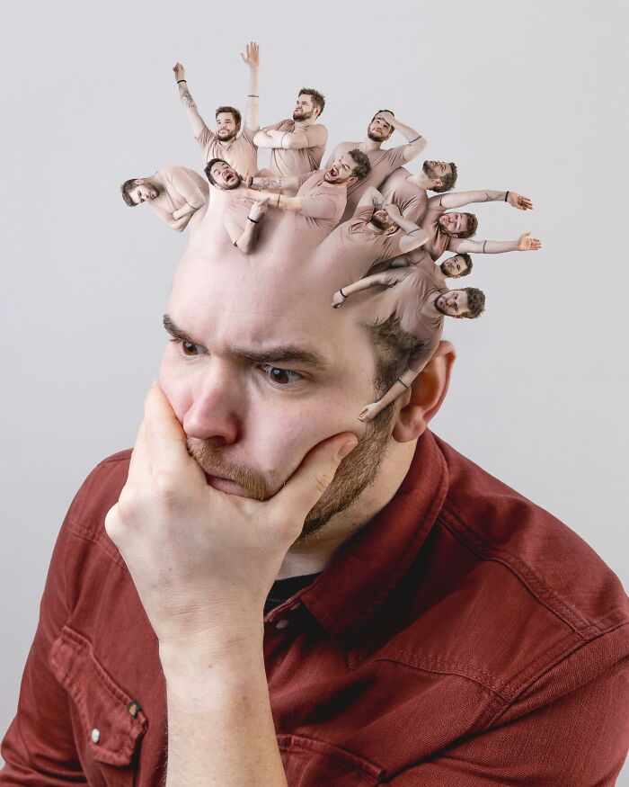 Man in a red shirt showing logic-challenging photo manipulations with multiple smaller versions of himself emerging from his head.
