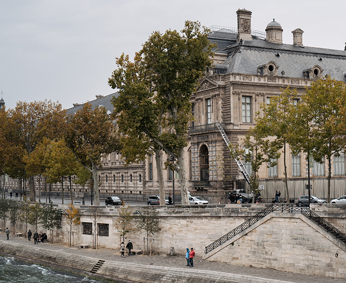 The Louvre Museum exterior with trees and pedestrians, linked to America’s most notorious jewel thief and smuggling tricks. The Louvre Museum exterior with trees and pedestrians, linked to America’s most notorious jewel thief and smuggling tricks.