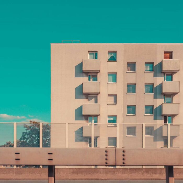 Minimalist architectural vision of Olle L shown in a simple building facade with clean lines and muted color tones.