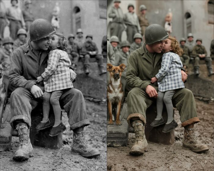 Vintage black-and-white photograph restored with color showing a soldier hugging a young girl and a dog nearby.