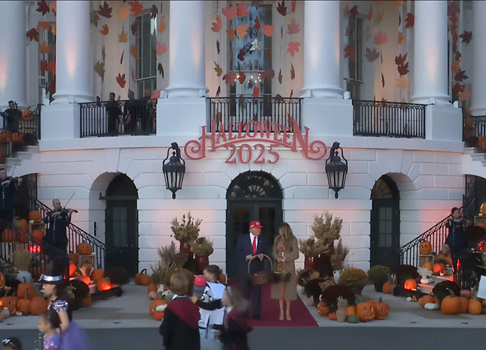 White House Halloween display with pumpkins and autumn leaves featuring Melania Trump's controversial decorations in 2025. White House Halloween display with pumpkins and autumn leaves featuring Melania Trump's controversial decorations in 2025.