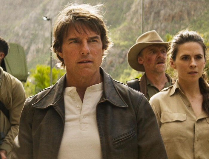 A group of celebrities outdoors in rugged attire, portraying intense emotions, linked to unknown celebrity facts shared by people.