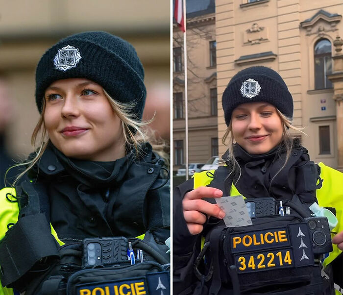 Young female police officer wearing uniform and beanie, captured in candid portrait showing her honest reaction.