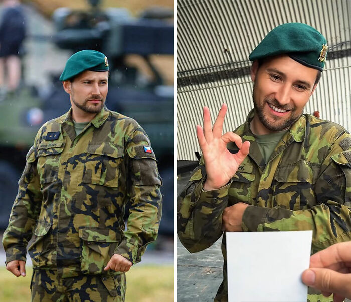 Soldier in camouflage uniform reacts with a smile and an OK gesture while looking at his own portrait captured by a photographer.
