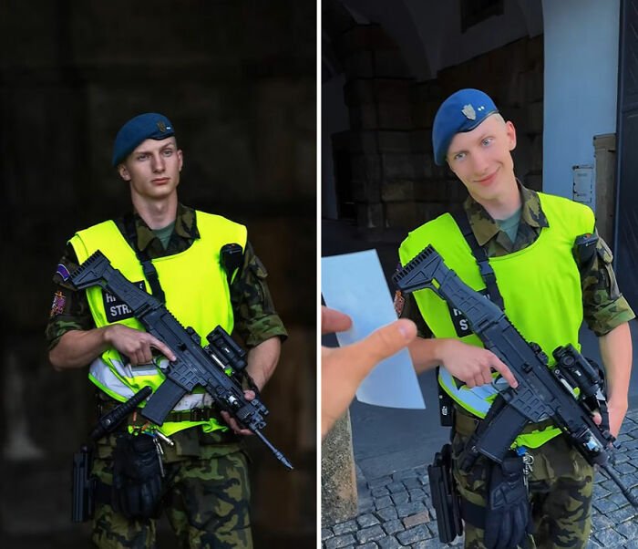 Soldier in camouflage and neon vest holding a gun, showing his portrait and reacting to the photographer's captured image.