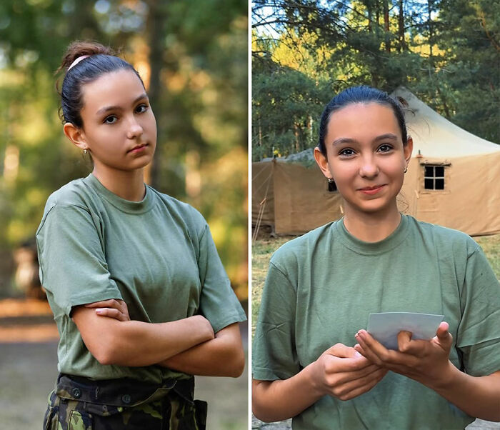 Young woman in green shirt showing honest reactions while looking at her own portrait photograph outdoors.