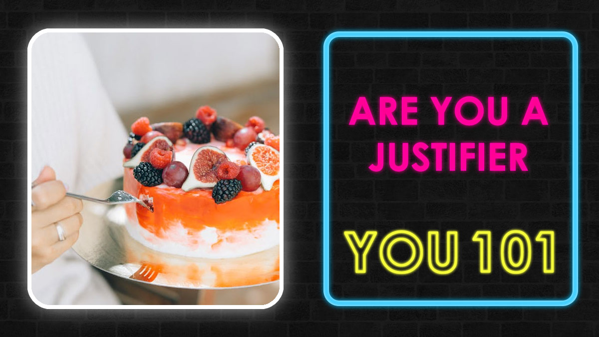 Hand holding fork near fruit-topped cake beside neon sign reading Are You A Justifier You 101 on black background