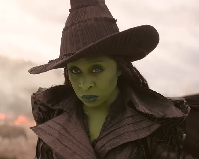 Ariana Grande with dramatic green makeup and dark hat, showcasing a bold new look that sparks fan backlash. Ariana Grande with dramatic green makeup and dark hat, showcasing a bold new look that sparks fan backlash.