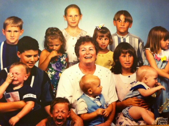 Large family photo with kids and adults showing awkward and cringed moments captured in family photos online.