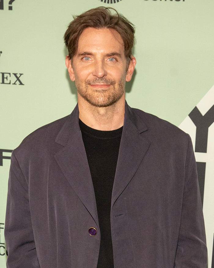 Bradley Cooper with a new hairstyle and beard at an event, showcasing his radical makeover look. Bradley Cooper with a new hairstyle and beard at an event, showcasing his radical makeover look.