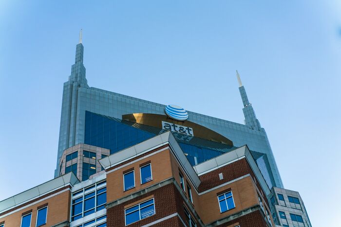 AT&T building under a clear sky, highlighting urban architecture and corporate branding in a cityscape view.