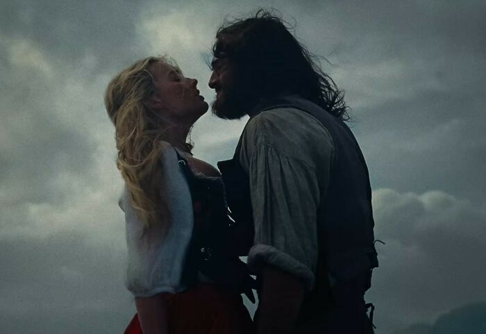 Margot Robbie and co-star in a tense scene from the provocative Wuthering Heights trailer under moody skies. Margot Robbie and co-star in a tense scene from the provocative Wuthering Heights trailer under moody skies.