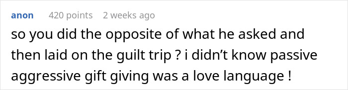 Comment about boyfriend refusing to hang anniversary gift on wall, highlighting passive-aggressive gift giving and guilt trips.