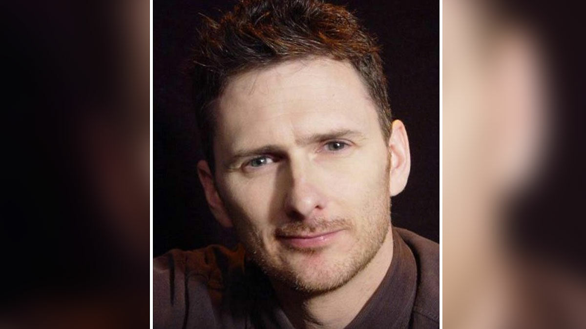 TV star with serious expression photographed against a dark background relating to capital punishment in China case