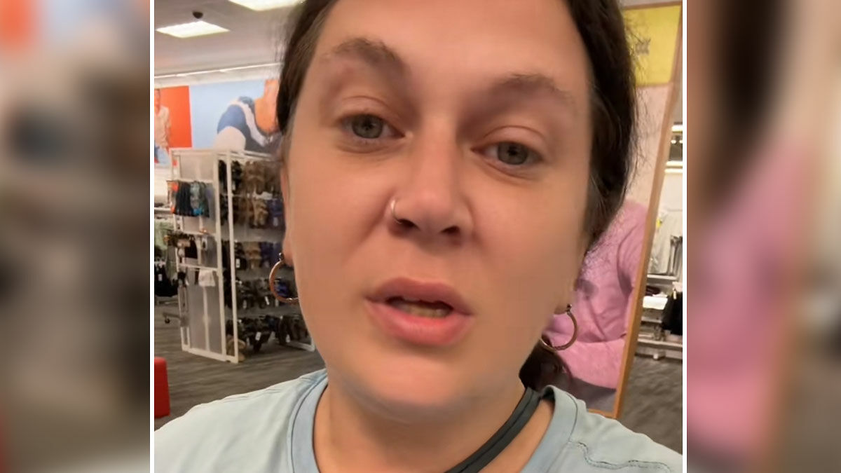 Close-up of a mom sharing her experience about daughter getting bullied for her clothes in a store setting.