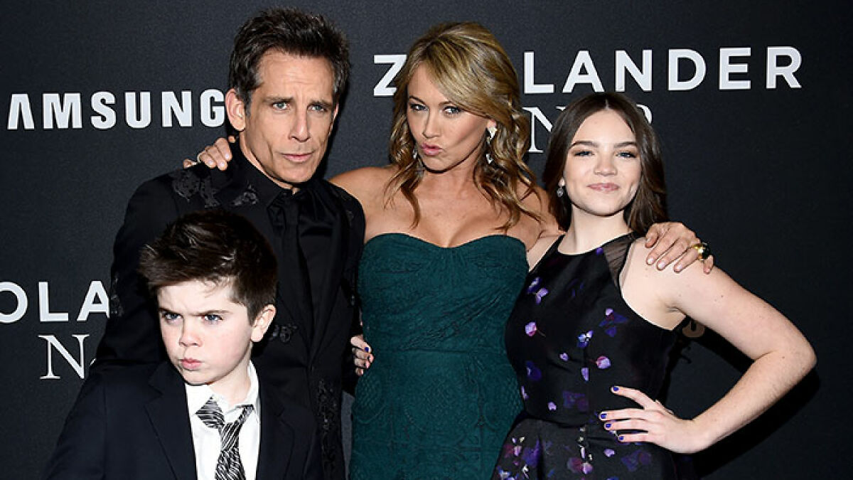 Ben Stiller with his nepo baby kids and partner at a red carpet event, posing for photos in formal attire.
