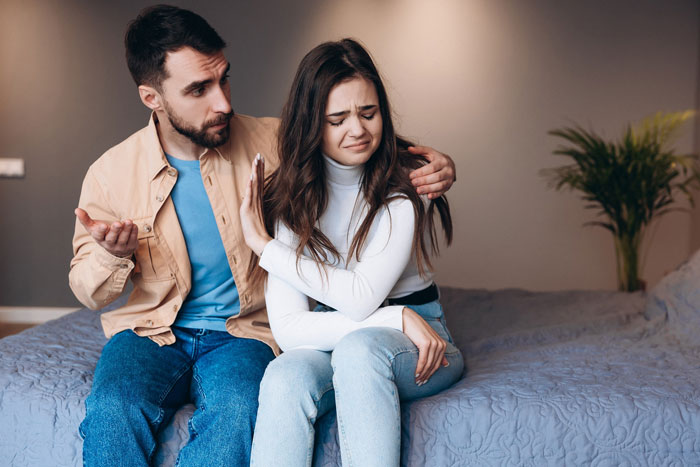 Man uses boys trip excuse as disguise for affair while woman shows distress and refuses to engage during serious talk at home. Man uses boys trip excuse as disguise for affair while woman shows distress and refuses to engage during serious talk at home.