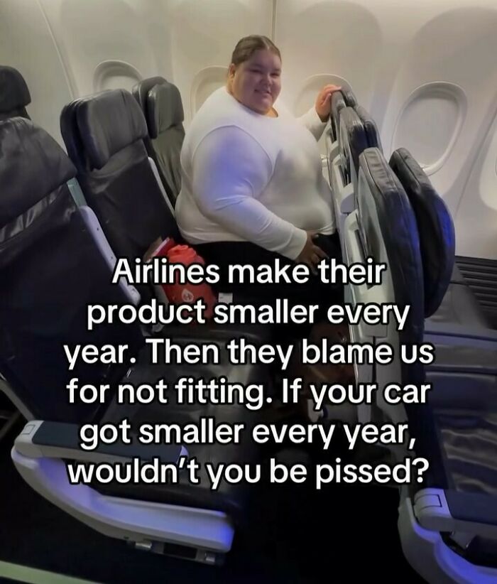 Plus-size activist seated on airplane, highlighting issues with shrinking airline seats and fit challenges. Plus-size activist seated on airplane, highlighting issues with shrinking airline seats and fit challenges.