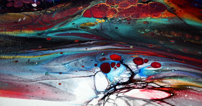 Abstract fluid art with vibrant colors and intricate patterns showcasing mesmerizing faux pillow fluid art beneath black.