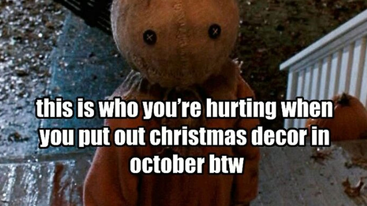 Horror movie meme with a creepy doll about hurting Halloween spirit by putting out Christmas decor early.