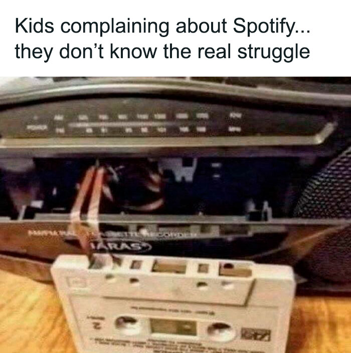 Old cassette player with tape partially ejected and text about kids complaining, nostalgic 90s posts memory unlock.