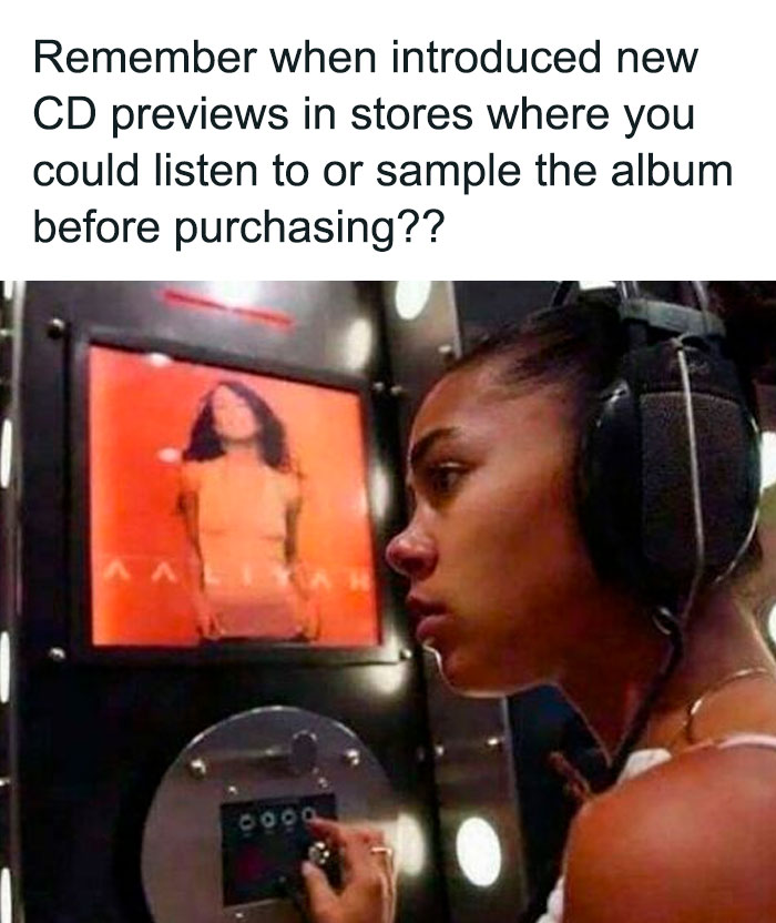 Young woman listening to '90s CD previews in store headphones, recalling nostalgic memories from the 1990s era.