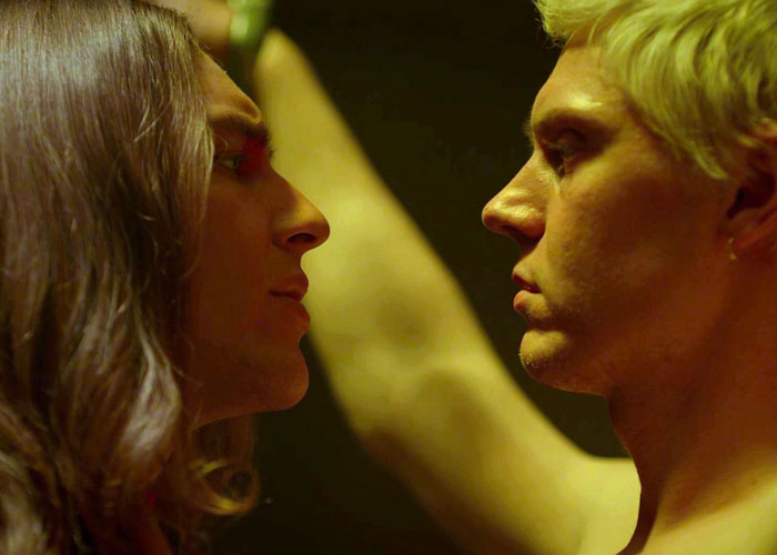 Two people facing each other closely, portraying tension linked to masculinity so fragile and relationship conflict. Two people facing each other closely, portraying tension linked to masculinity so fragile and relationship conflict.