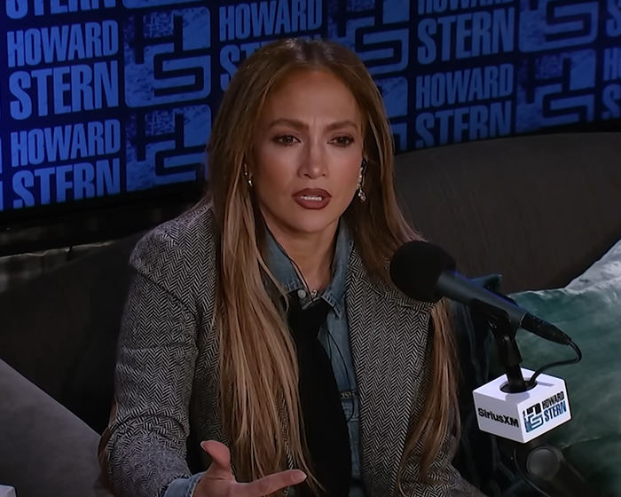 Jennifer Lopez speaking on Howard Stern show, addressing accusations from her ex-husband in a heated interview. Jennifer Lopez speaking on Howard Stern show, addressing accusations from her ex-husband in a heated interview.