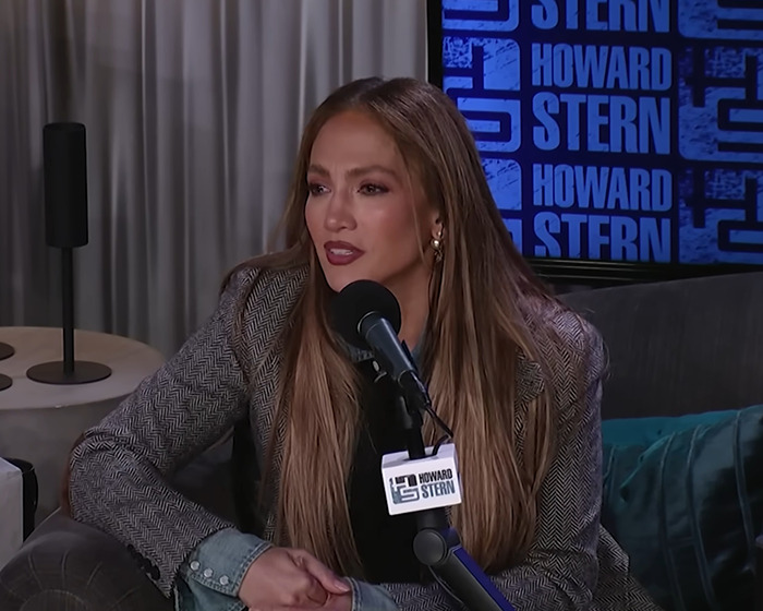 Jennifer Lopez during a Howard Stern interview, discussing personal topics related to her ex-husband and accusations. Jennifer Lopez during a Howard Stern interview, discussing personal topics related to her ex-husband and accusations.
