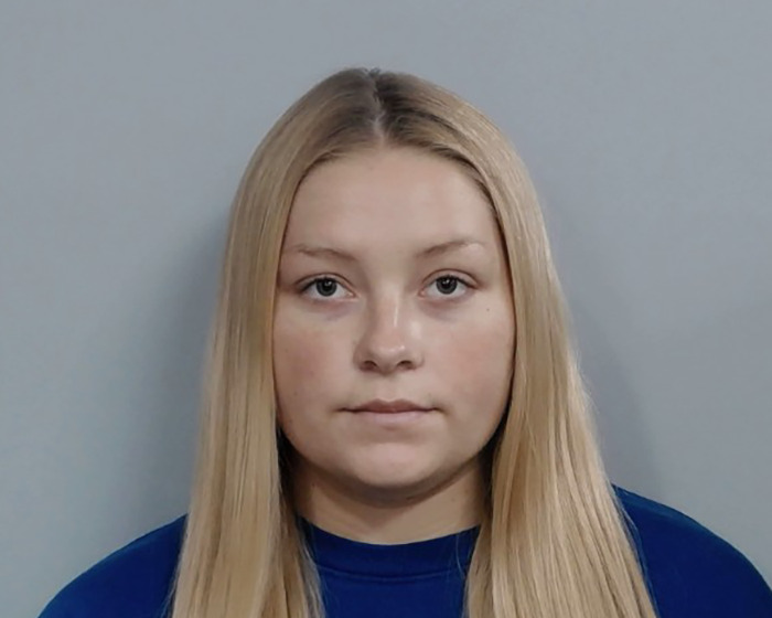 Young woman with long blonde hair and a neutral expression, related to the Laken Snelling baby case controversy. Young woman with long blonde hair and a neutral expression, related to the Laken Snelling baby case controversy.