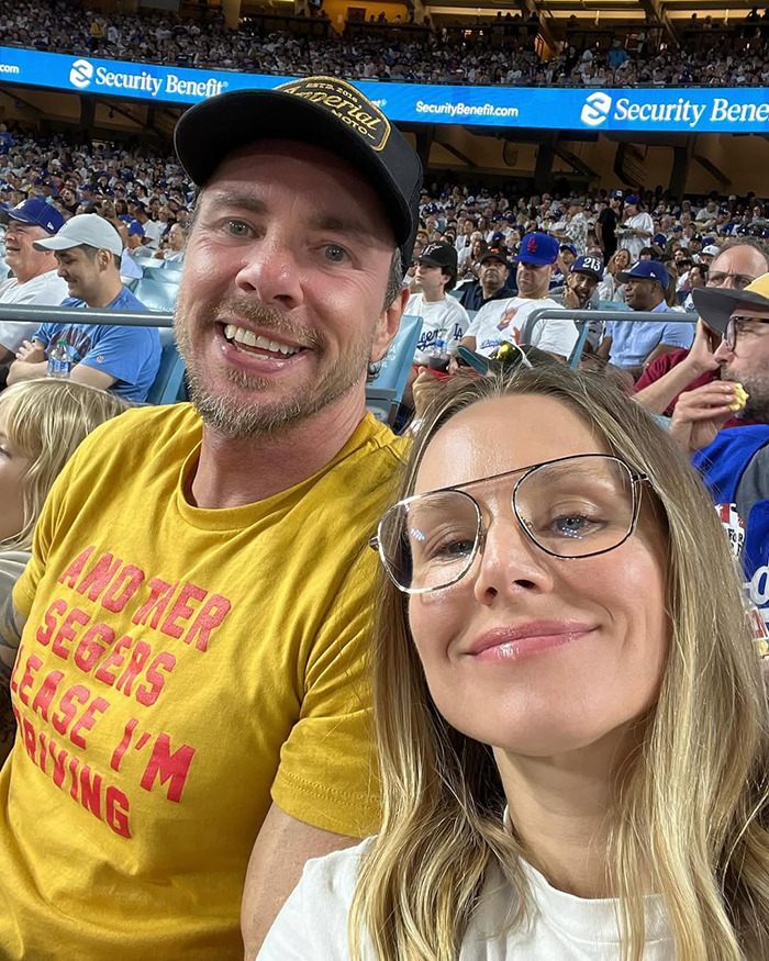 Kristen Bell and Dax Shepard smiling together at a crowded stadium, amid talks of their toxic marriage and blackout fights. Kristen Bell and Dax Shepard smiling together at a crowded stadium, amid talks of their toxic marriage and blackout fights.
