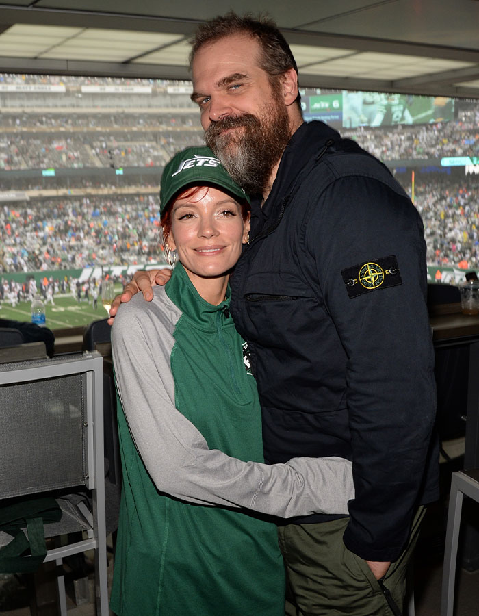 Lily Allen and David Harbour embracing at a crowded sports stadium, linked to explosive album and cheating claims. Lily Allen and David Harbour embracing at a crowded sports stadium, linked to explosive album and cheating claims.