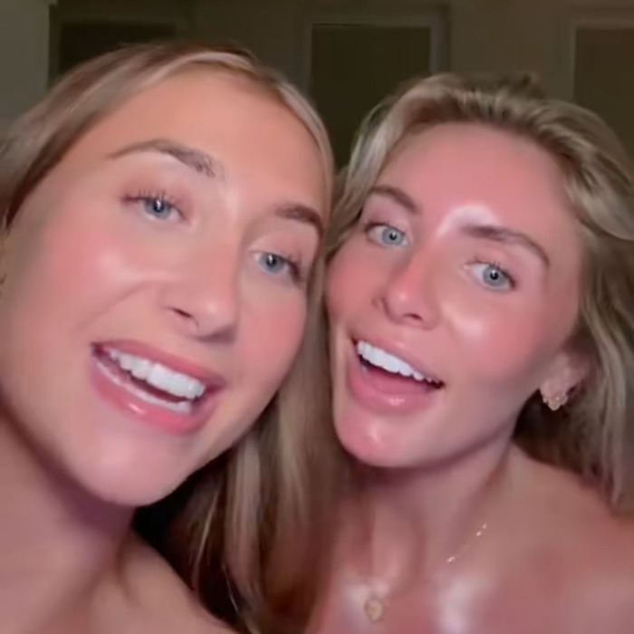 Two smiling women with blonde hair and blue eyes posing closely in a casual indoor setting for fame discussion. Two smiling women with blonde hair and blue eyes posing closely in a casual indoor setting for fame discussion.