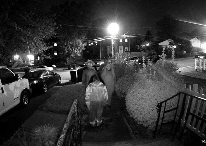 Masked trio caught on doorbell camera during disturbing prank at night leaves victim shocked by staggering twist outdoors.