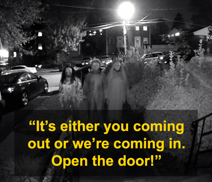 Three masked individuals captured in a disturbing doorbell prank caught on night surveillance footage. Three masked individuals captured in a disturbing doorbell prank caught on night surveillance footage.