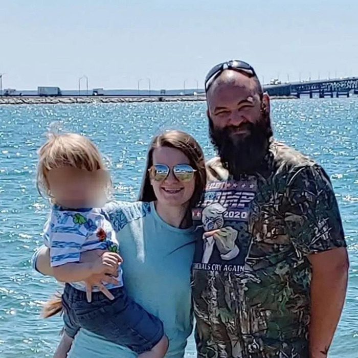 Family posing by a sunny waterfront wearing casual clothes, linked to Mormons raising funds for Michigan church incident. Family posing by a sunny waterfront wearing casual clothes, linked to Mormons raising funds for Michigan church incident.