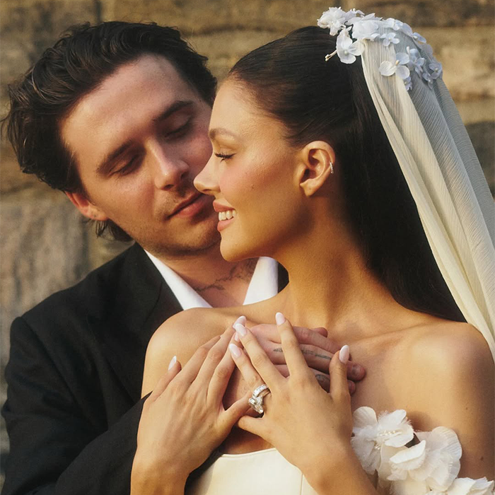 Couple in wedding attire sharing an intimate moment, highlighting a very creepy relationship theme for SEO. Couple in wedding attire sharing an intimate moment, highlighting a very creepy relationship theme for SEO.
