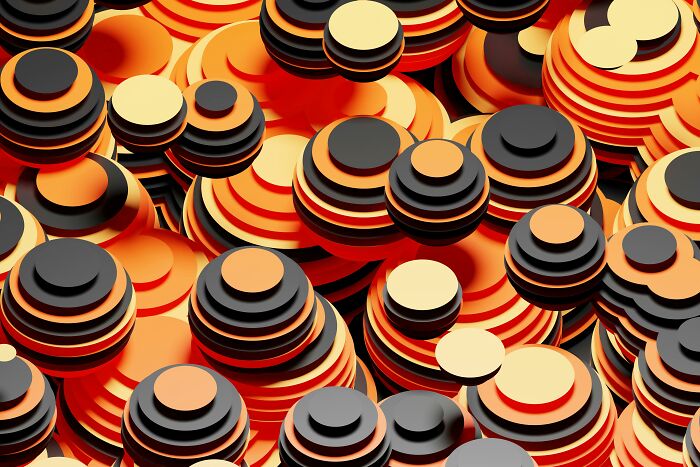 Abstract pattern with layered circular shapes in orange, black, and cream, perfect for testing pattern-spotting skills. Abstract pattern with layered circular shapes in orange, black, and cream, perfect for testing pattern-spotting skills.