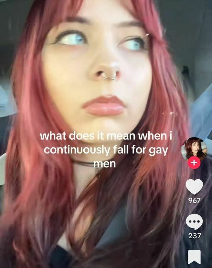 Young woman with red hair and septum piercing looking sideways, with meme text about falling for gay men and evil thoughts humor.