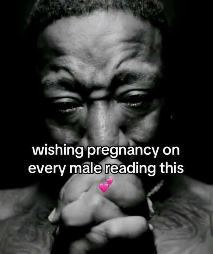 Close-up of a man's intense facial expression with text wishing pregnancy on every male, featuring evil thoughts meme theme.
