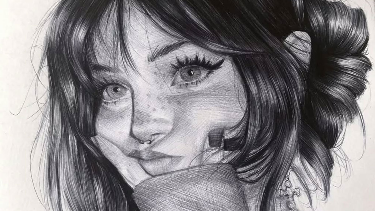 Detailed ballpoint pen portrait of a young woman with expressive eyes and textured hair, showcasing photorealistic drawing skills.