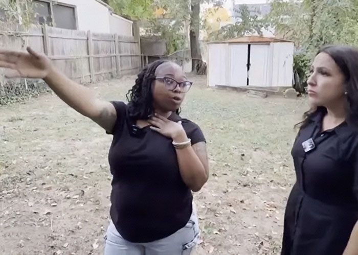 Woman gestures while explaining disturbing doorbell prank and masked trio twist to a concerned reporter outdoors. Woman gestures while explaining disturbing doorbell prank and masked trio twist to a concerned reporter outdoors.